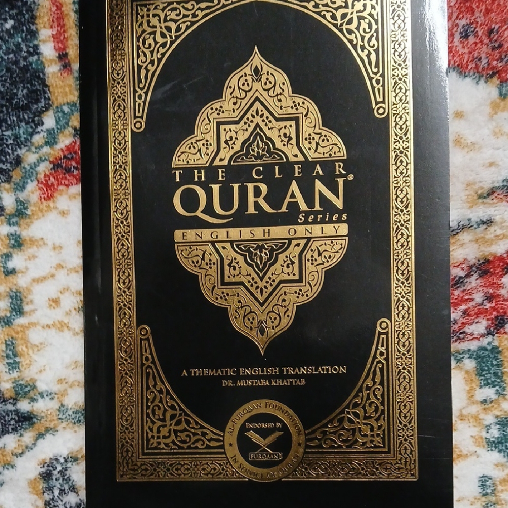 The Clear Quran Series - Elegant Black and Gold Cover